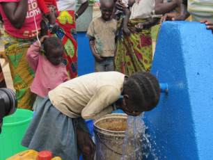 student drinking clean water